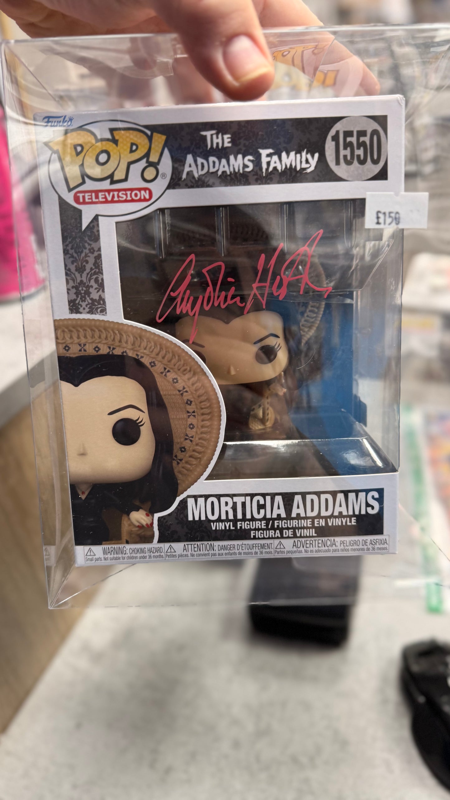 Morticia Addams signed by Anjelica Hudson