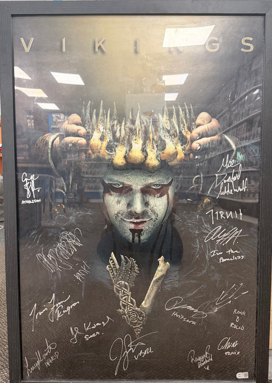 Vikings multi-signed poster in a black frame, with signatures and character inscriptions – full framed poster
