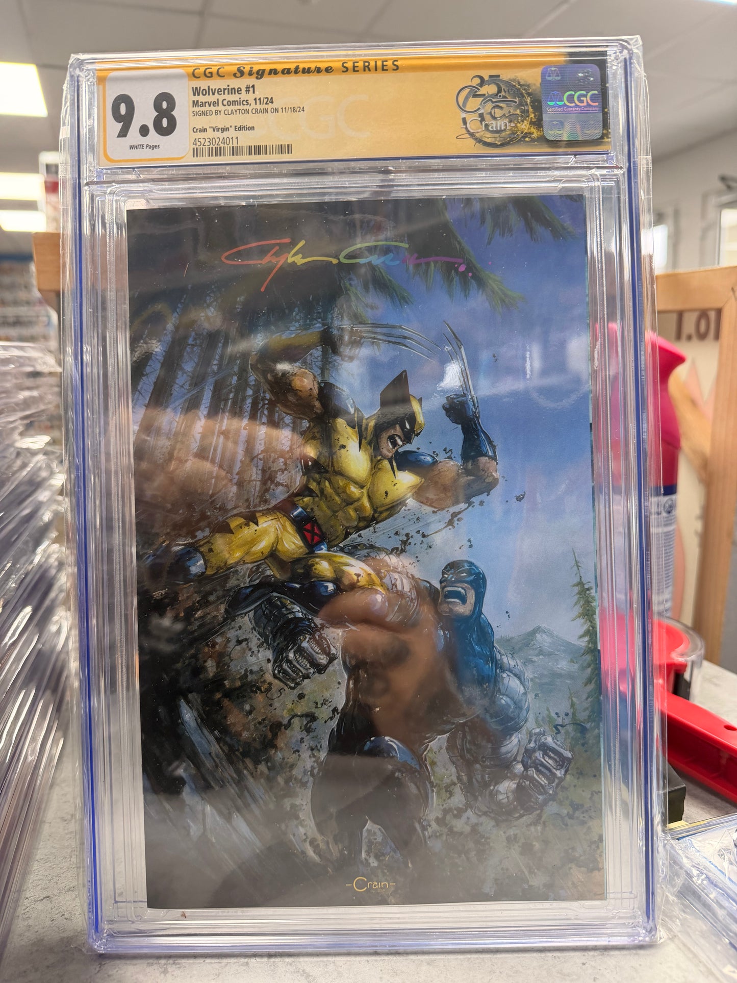 CGC SS 9.8 Wolverine #1 Rainbow Signed