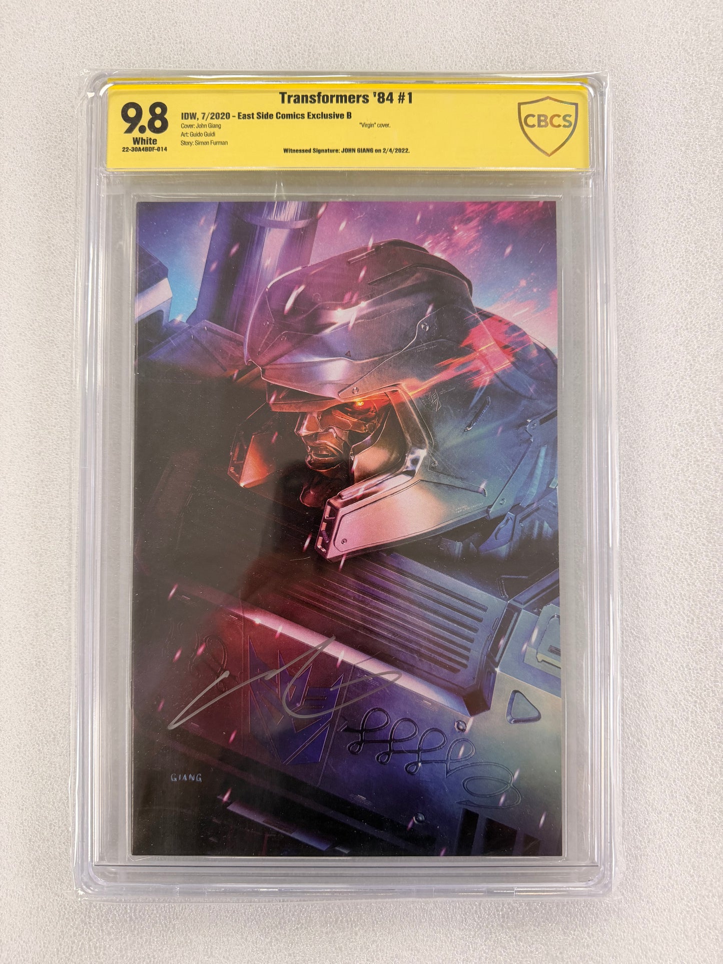 Transformers '84 #1 CBCS 9.8 – John Giang Signed Virgin Variant