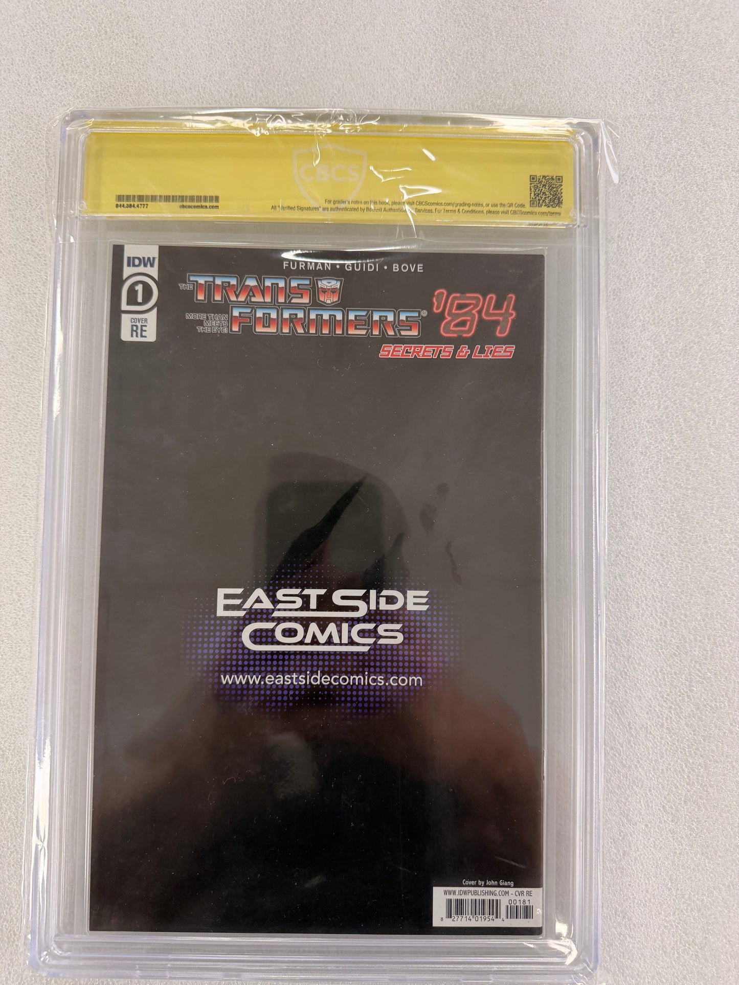 Transformers '84 #1 CBCS 9.8 – John Giang Signed Virgin Variant