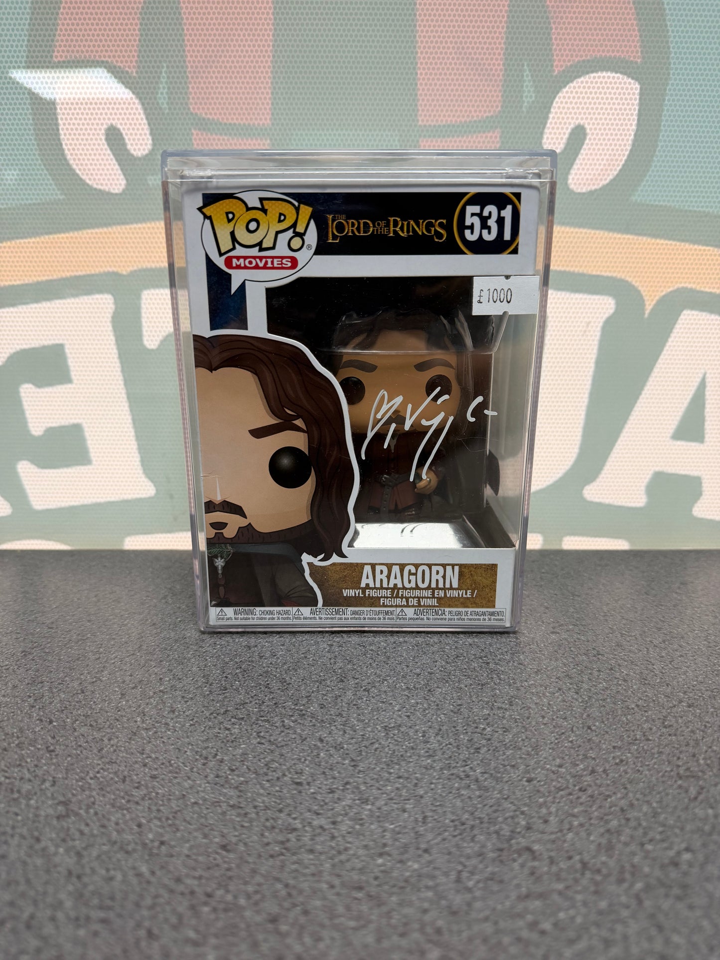Viggo Mortensen signed Aragorn Funko Pop #531 – front with white autograph