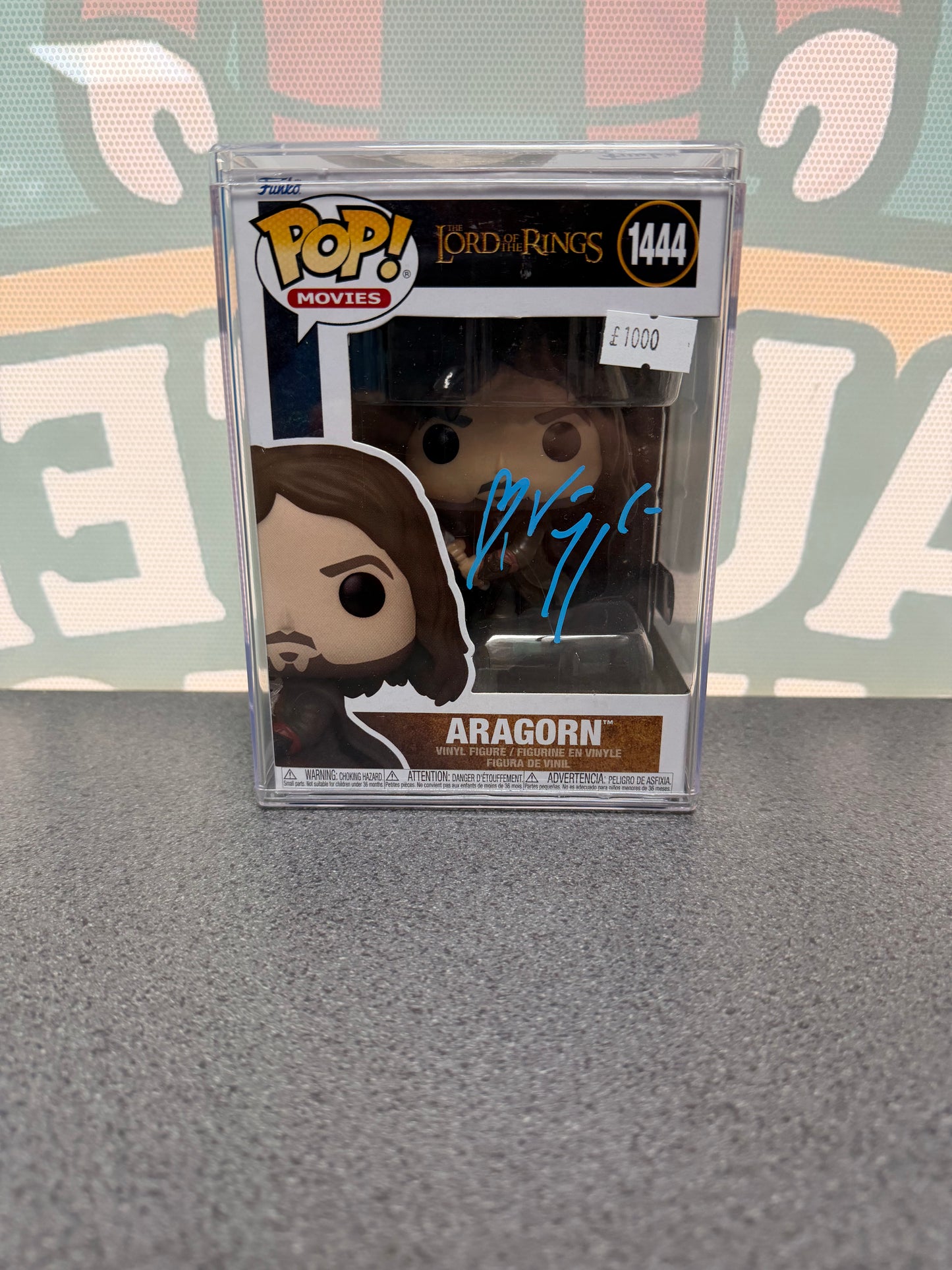 Viggo Mortensen signed Aragorn Funko Pop #1444 – front with blue autograph