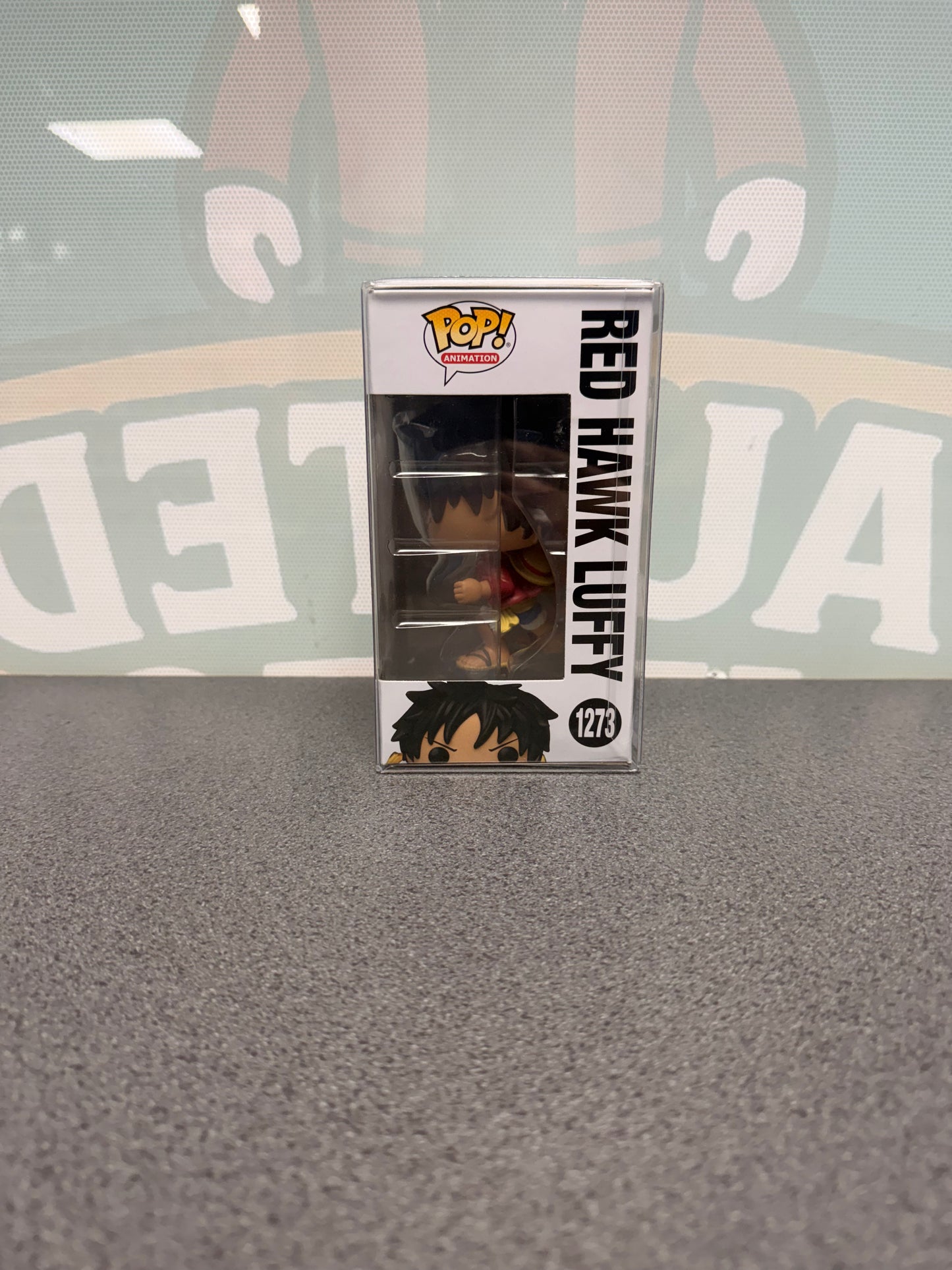 Red Hawk Luffy Funko Pop! #1273 – Glow Chase – window side of box