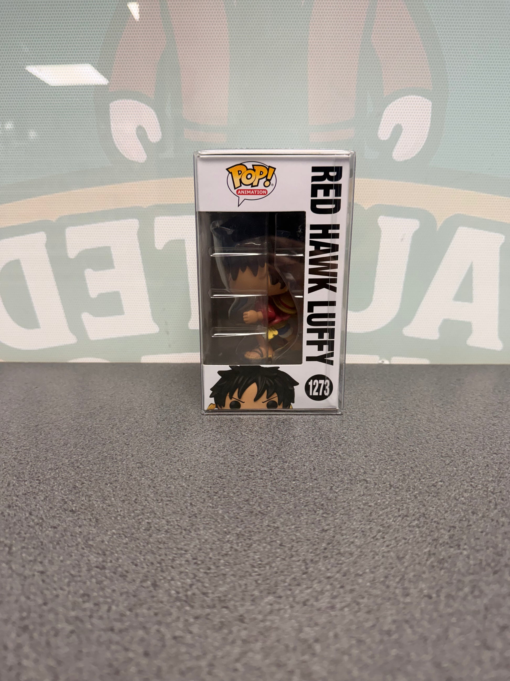 Red Hawk Luffy Funko Pop! #1273 – Glow Chase – window side of box