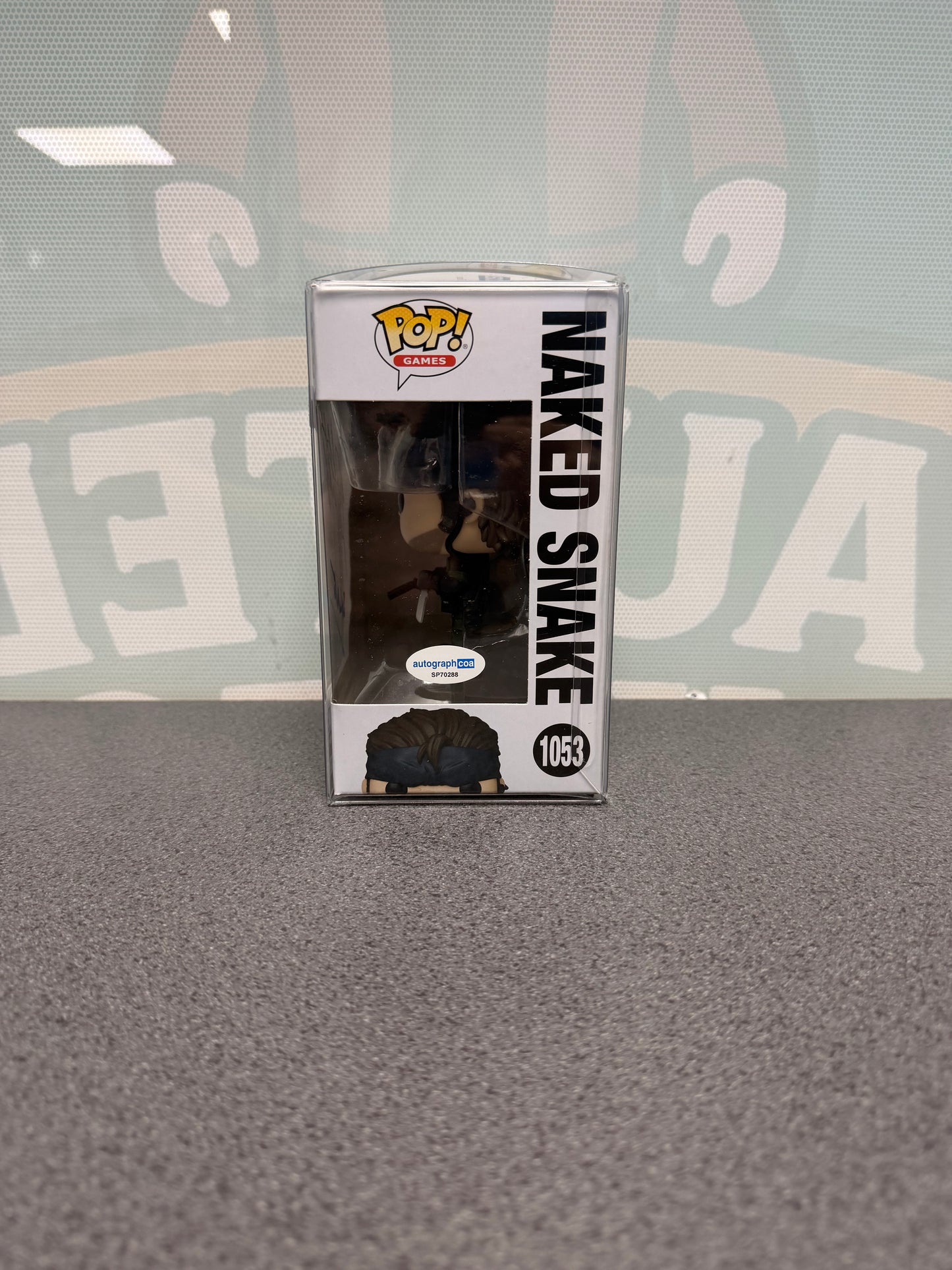 Naked Snake Funko Pop! #1053 – window side of box with ACOA sticker