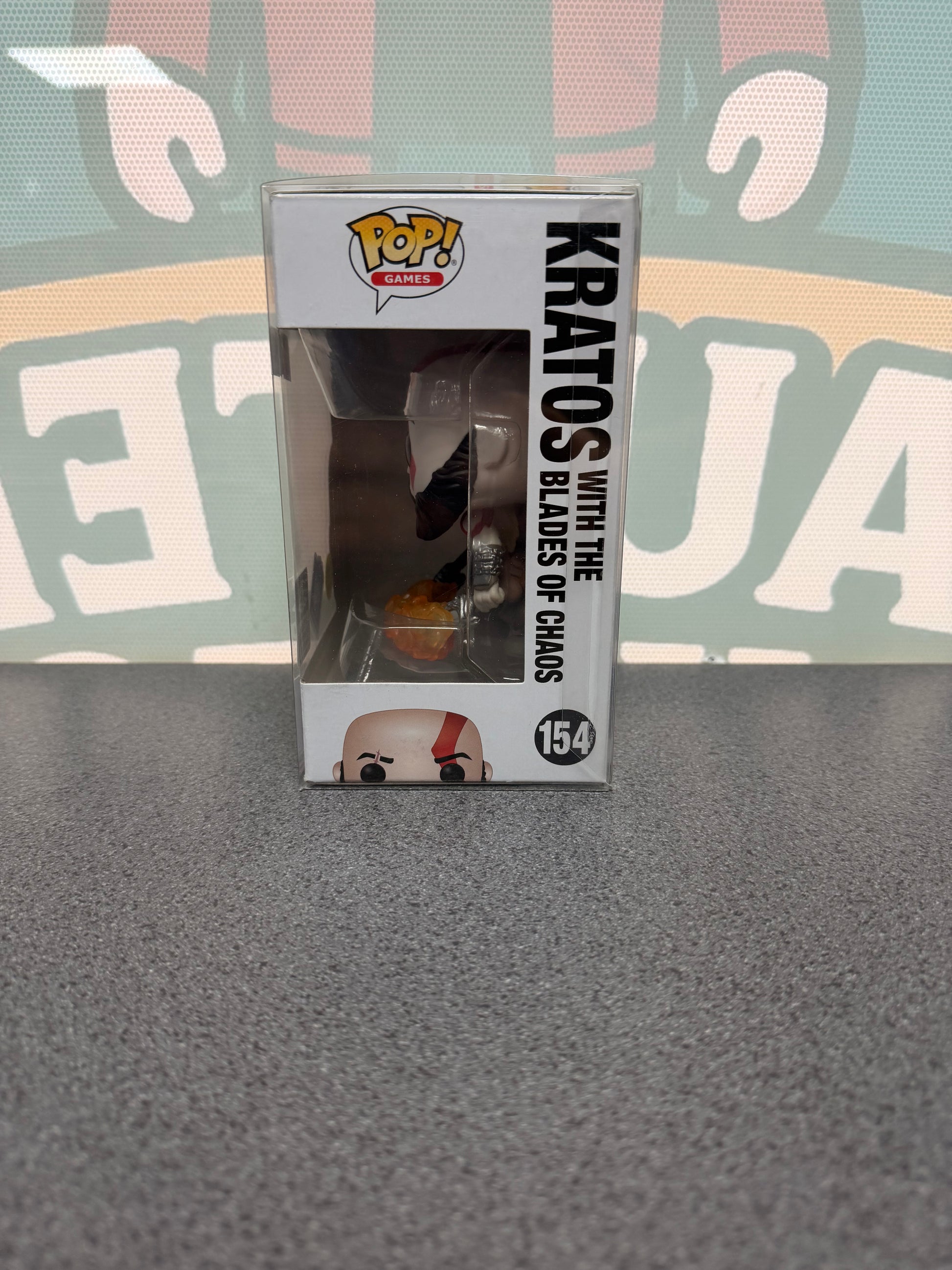 Kratos with the Blades of Chaos Funko Pop! #154 Glow in the Dark – Funko Club Exclusive – God of War – window side of box