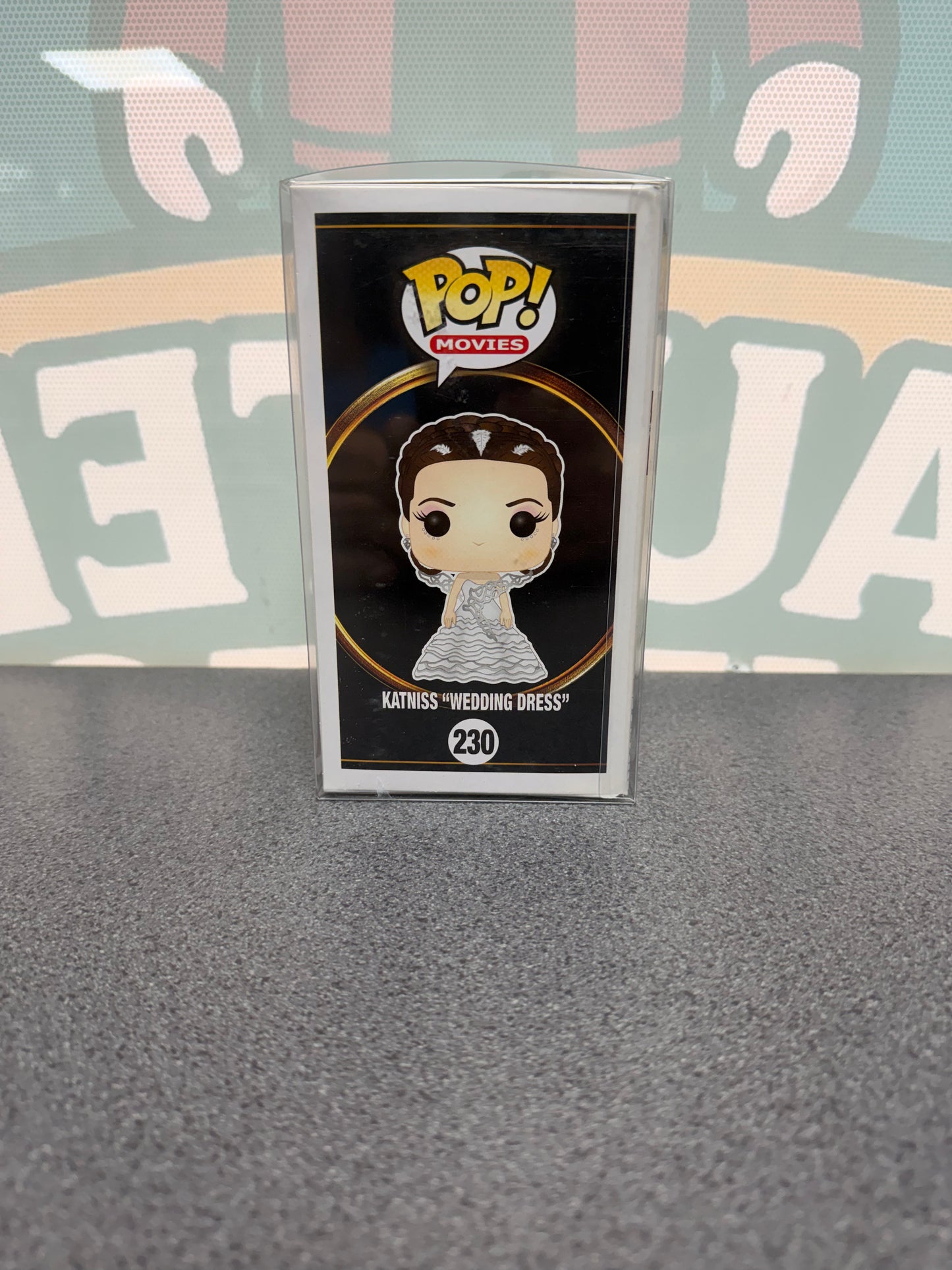 Katniss (Wedding Dress) Funko Pop! #230 – The Hunger Games – illustrated side of box