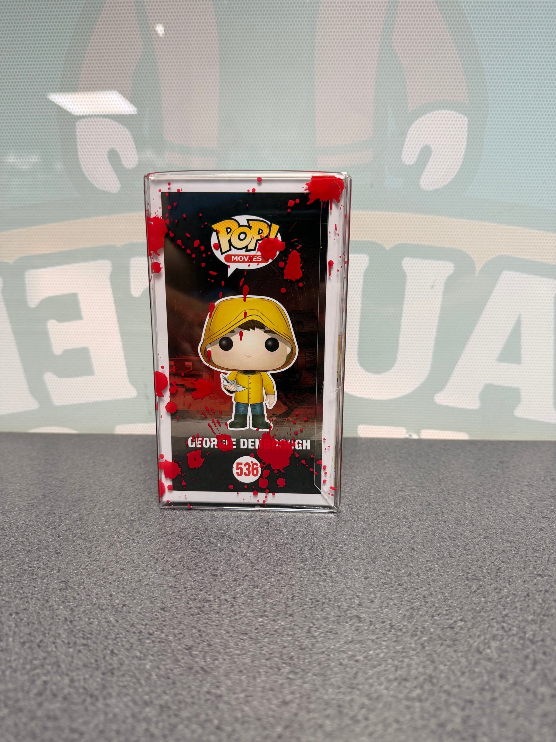 Georgie Denbrough Funko Pop! #536 Chase – IT – illustrated side of box in red-splatter protector