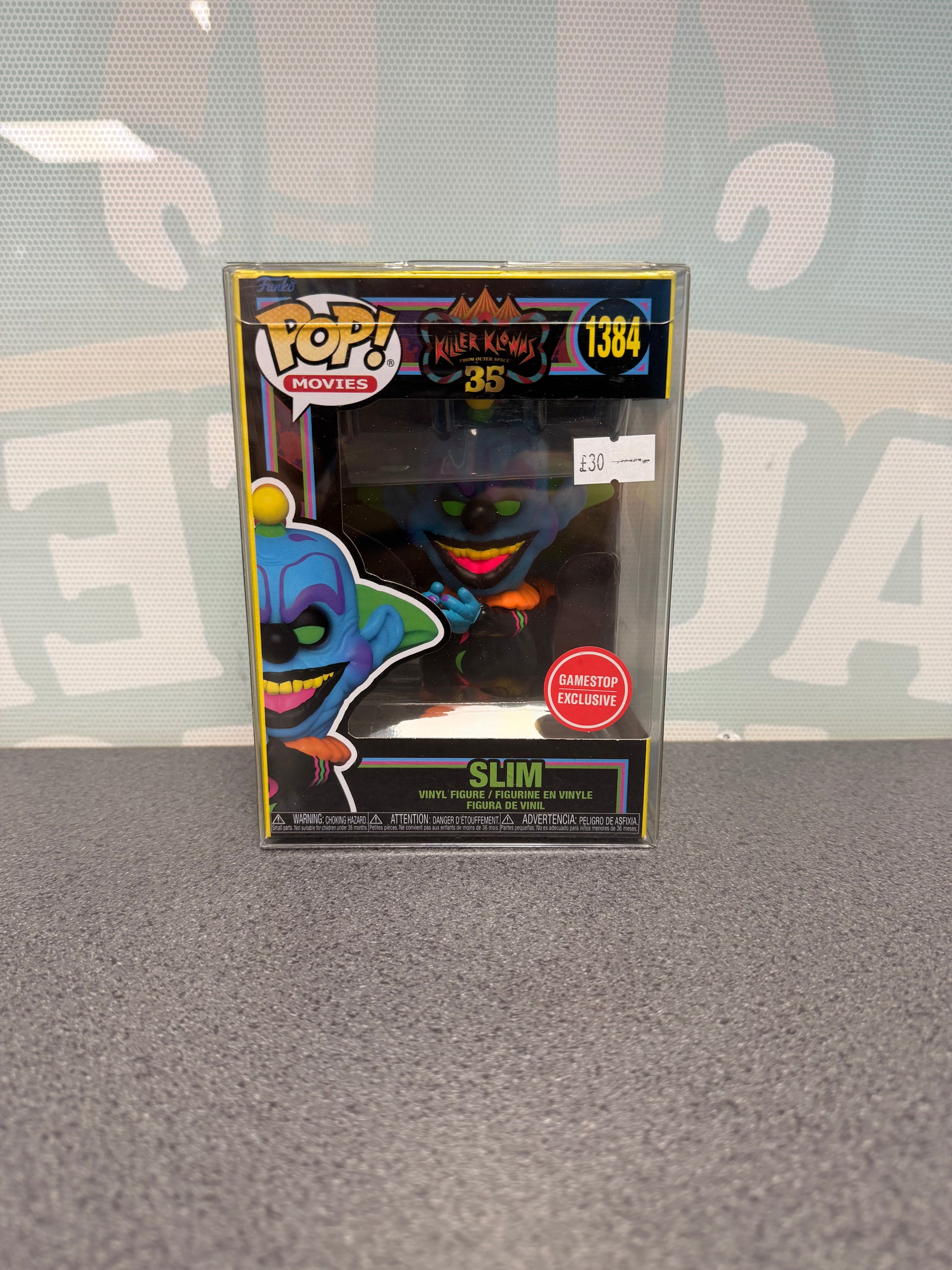Slim #1384 Blacklight GameStop Exclusive Funko Pop! from Killer Klowns from Outer Space – front of box and figure