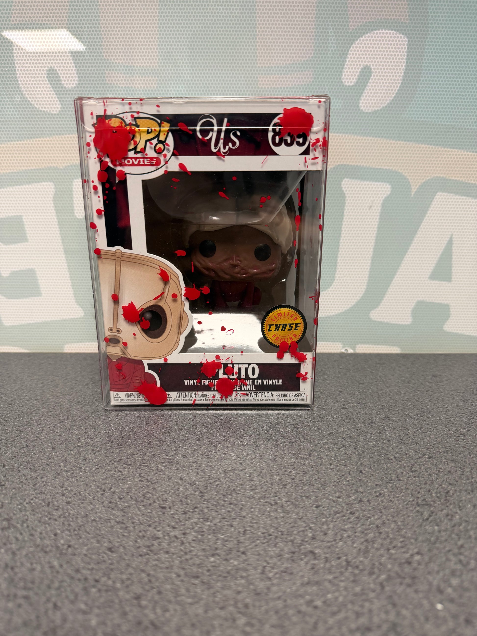Pluto #839 Chase Funko Pop! from Us – front of box and figure