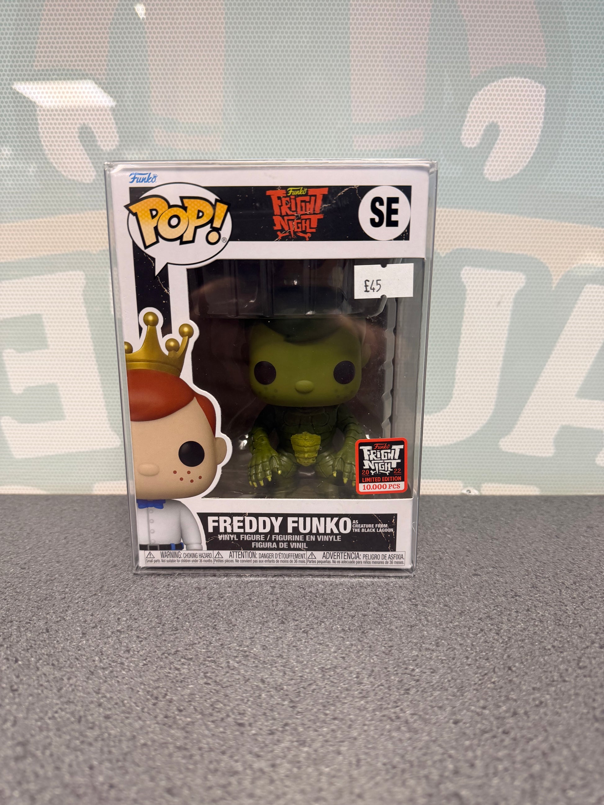 Front of Freddy Funko as Creature from the Black Lagoon Pop! SE with the 10,000-piece Fright Night sticker.