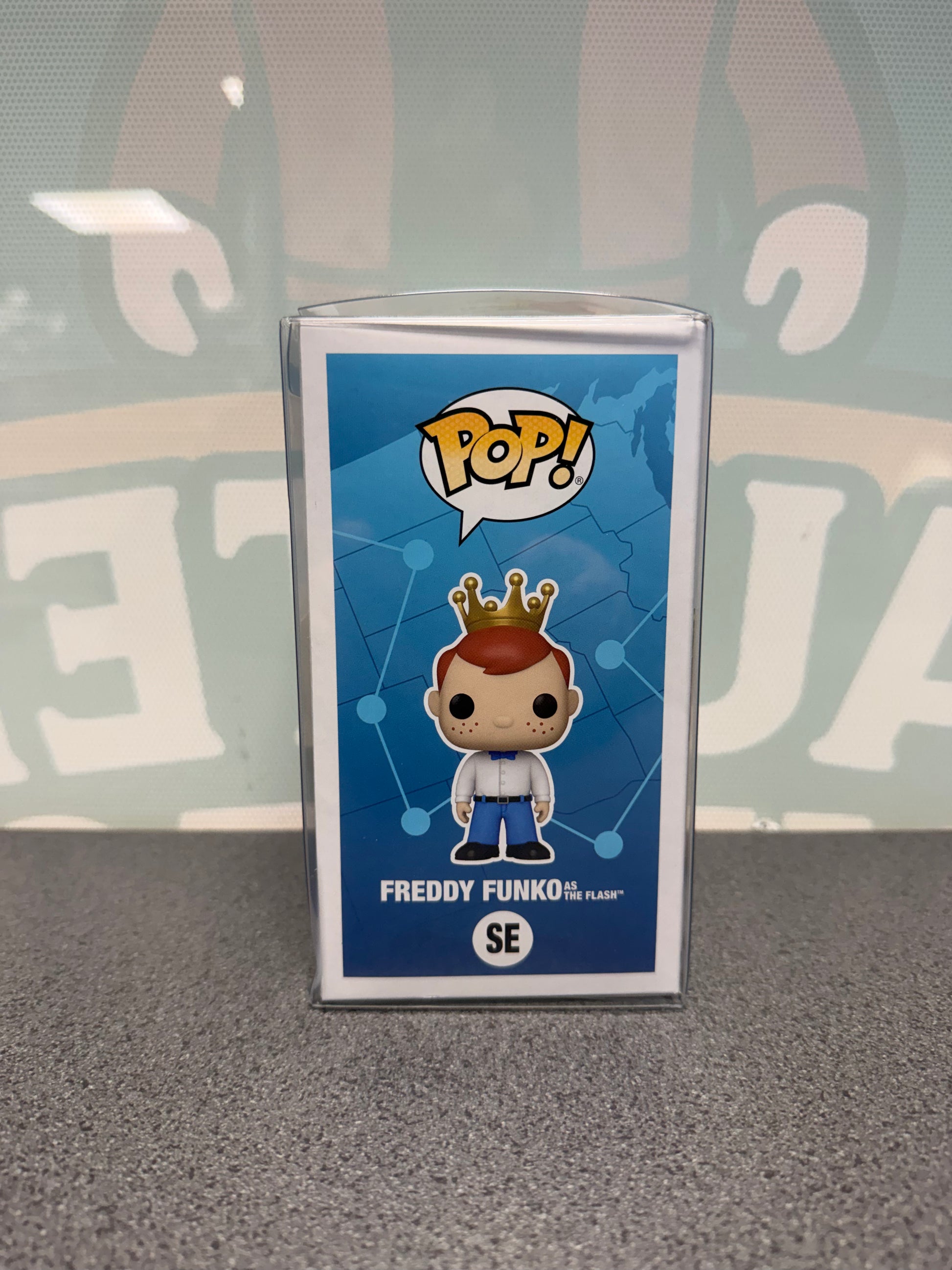 Illustrated Freddy Funko side panel of The Flash Chase Fun on the Run Pop! SE box.