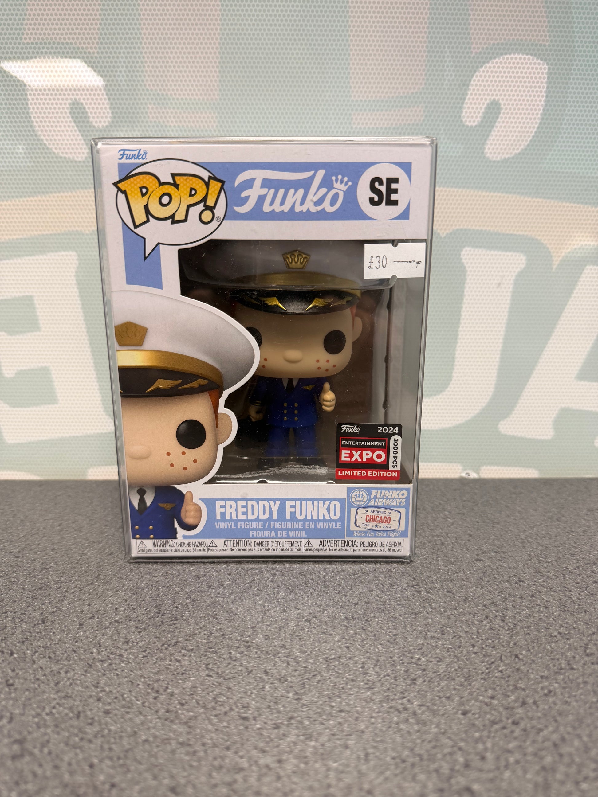 Front of Freddy Funko Pilot Pop! SE with Funko Airways Chicago artwork and the 3,000-piece 2024 Expo sticker.