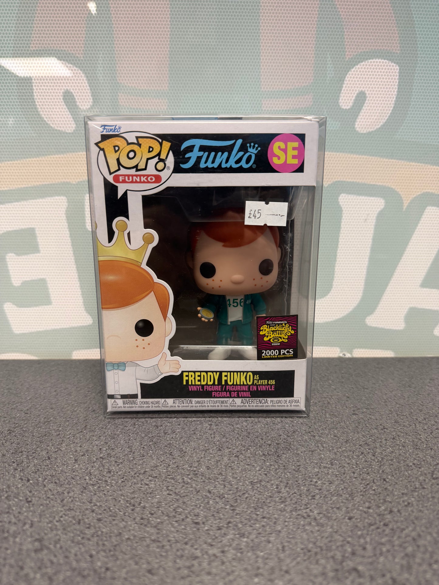 Front of Freddy Funko as Player 456 Pop! SE with the green tracksuit and 2,000-piece Fundays sticker.