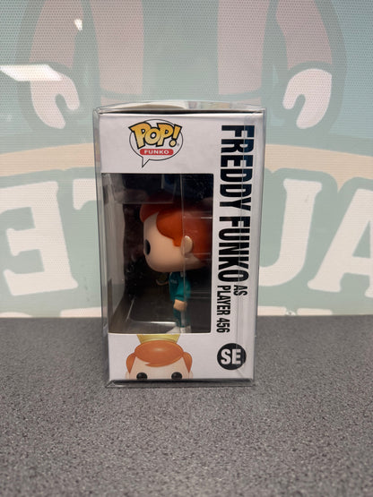 Window side of Freddy Funko as Player 456 Pop! SE showing the figure in profile.
