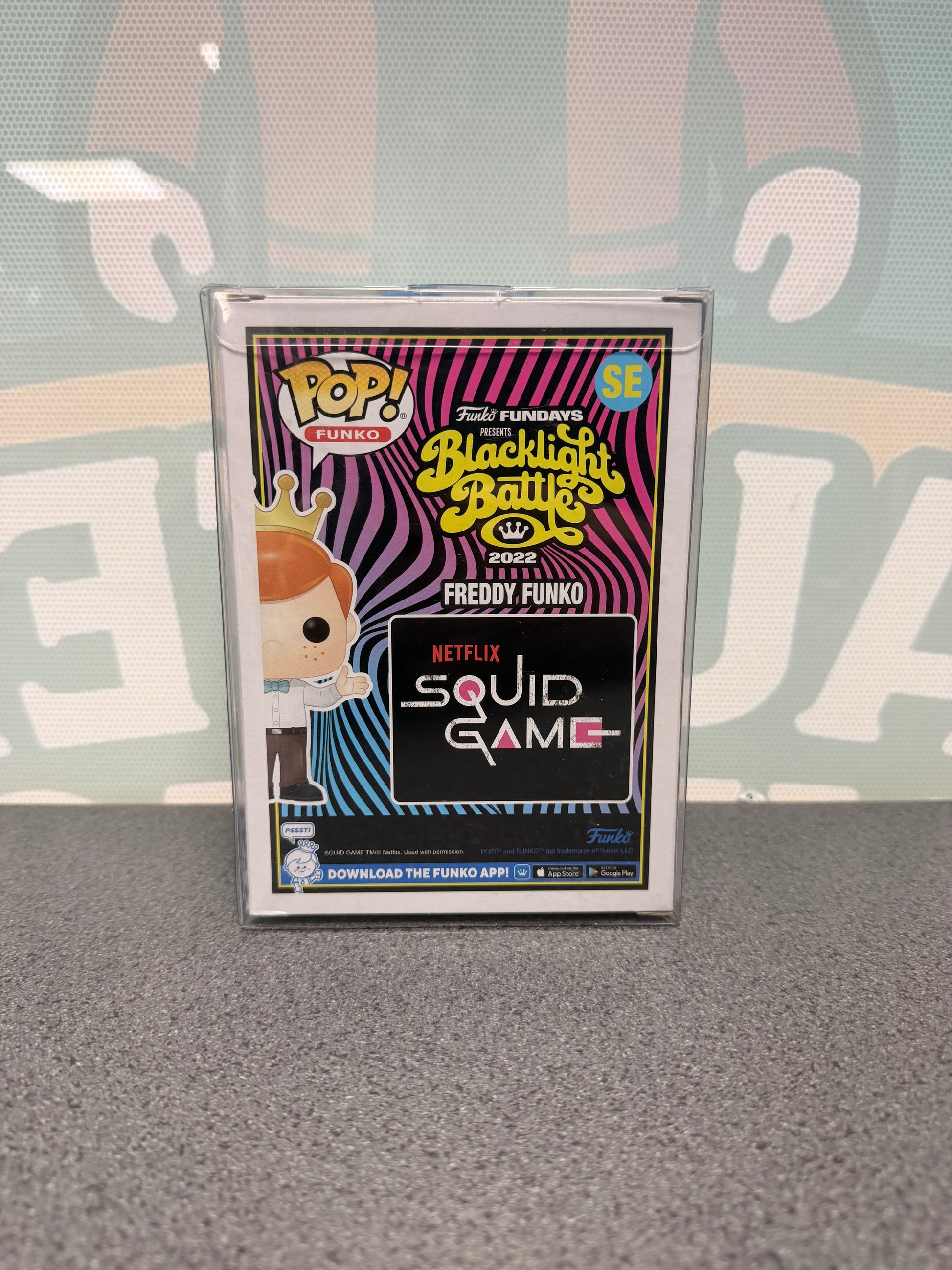 Rear of Freddy Funko as Player 456 Pop! SE with the Squid Game logo and Fundays 2022 artwork.