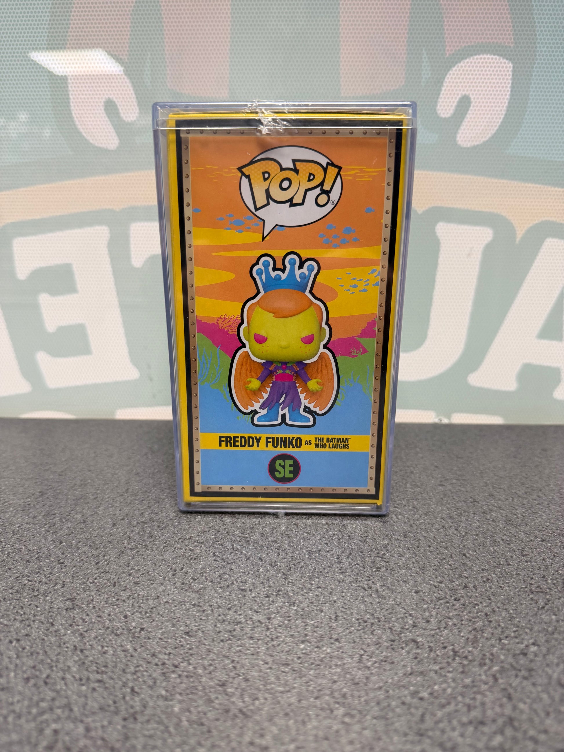 Illustrated side panel of Freddy Funko as The Batman Who Laughs Blacklight Pop! SE.