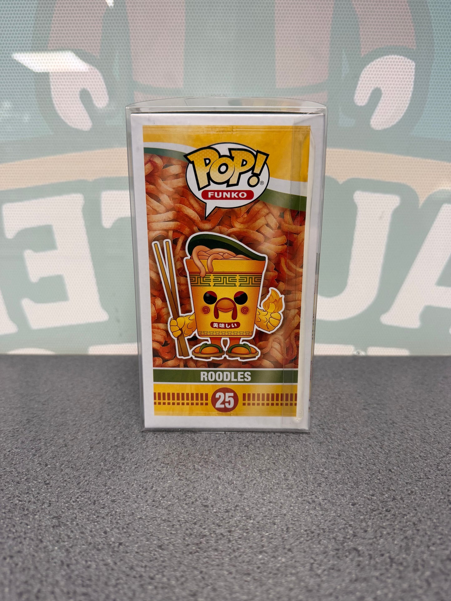 Illustrated side of the Roodles Funko Pop! #25 box with noodle-cup character artwork.