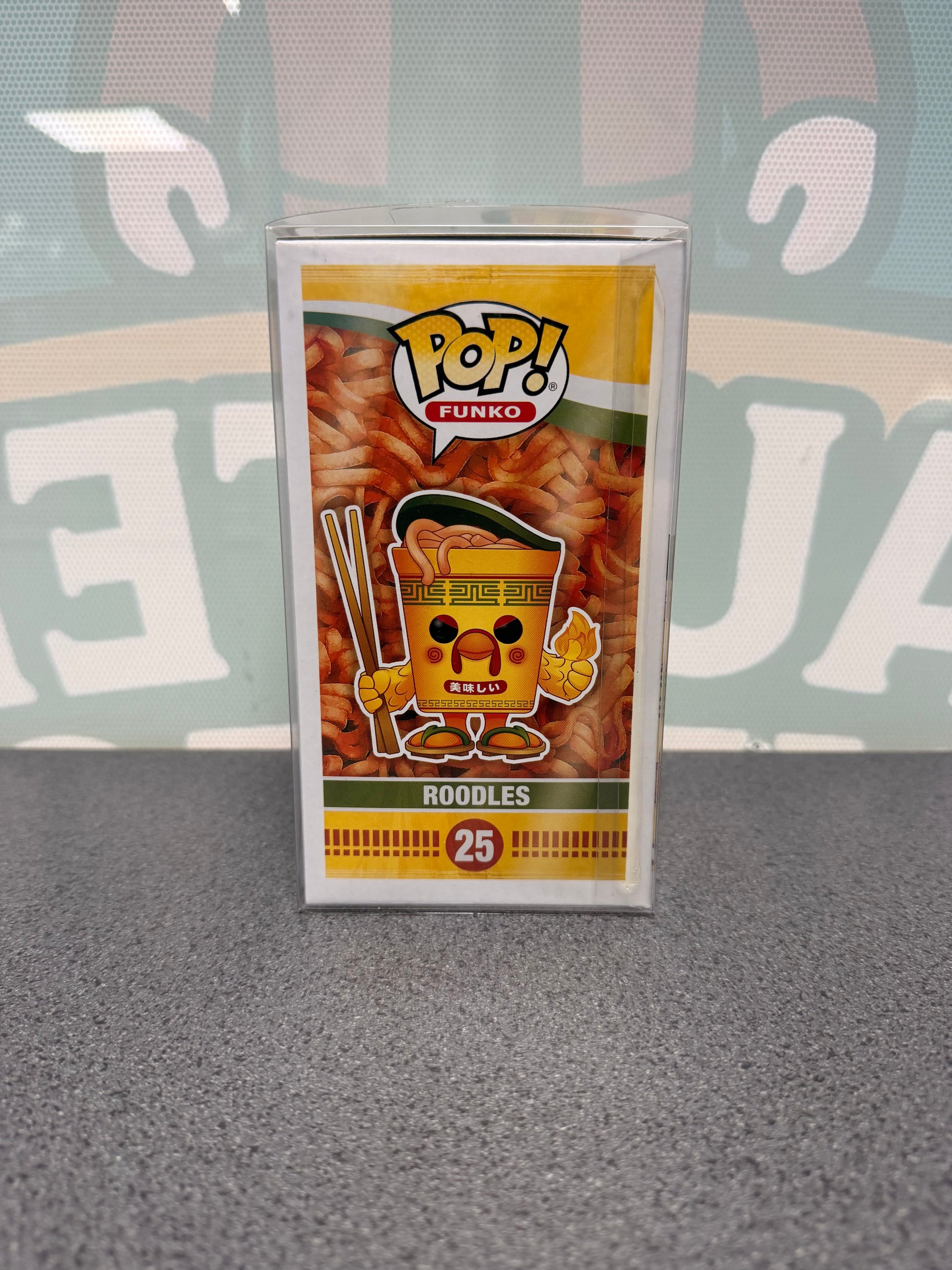 Illustrated side of the Roodles Funko Pop! #25 box with noodle-cup character artwork.