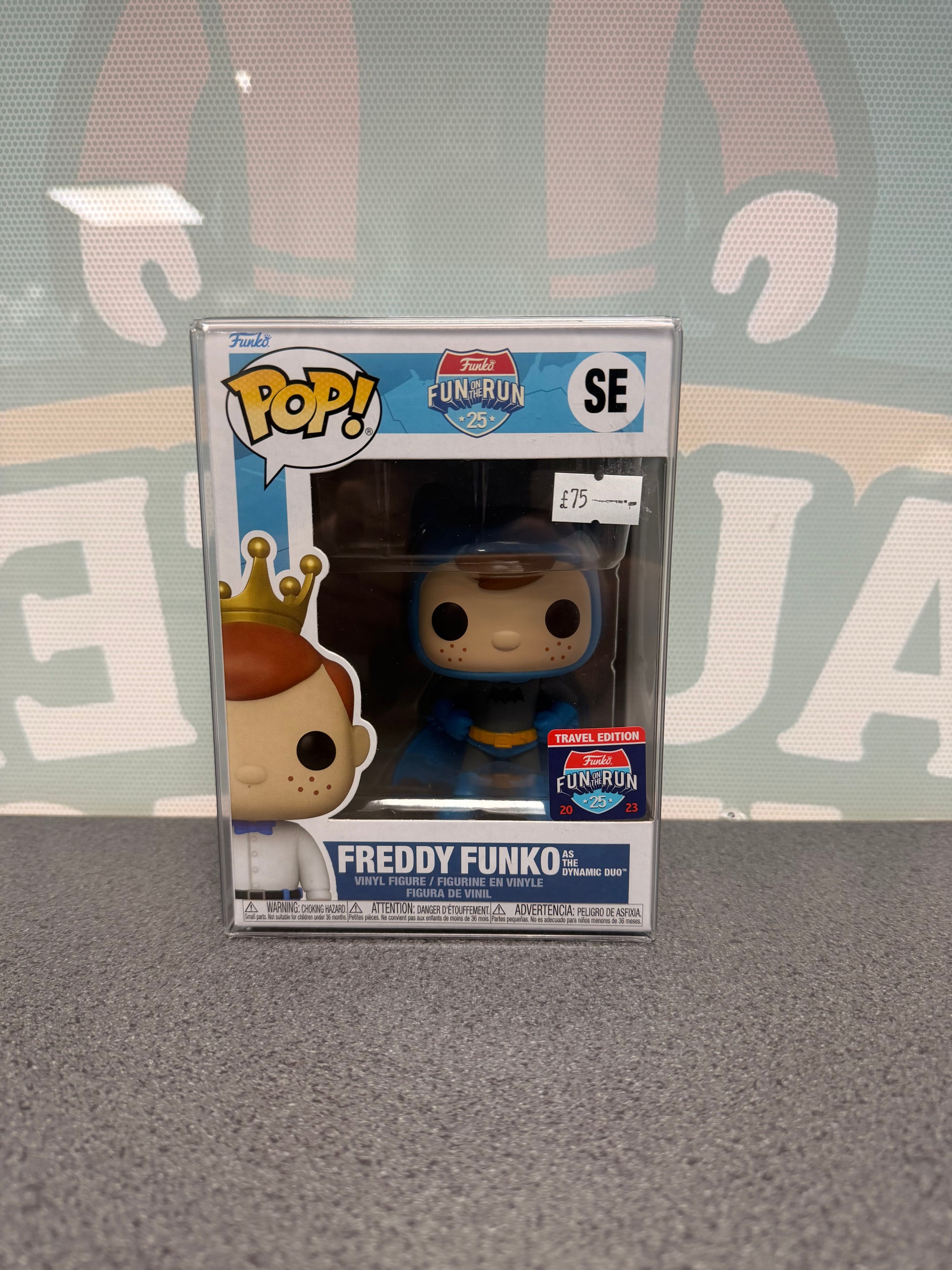 Front of Freddy Funko as the Dynamic Duo Batman Pop! SE with the 2023 Travel Edition sticker.
