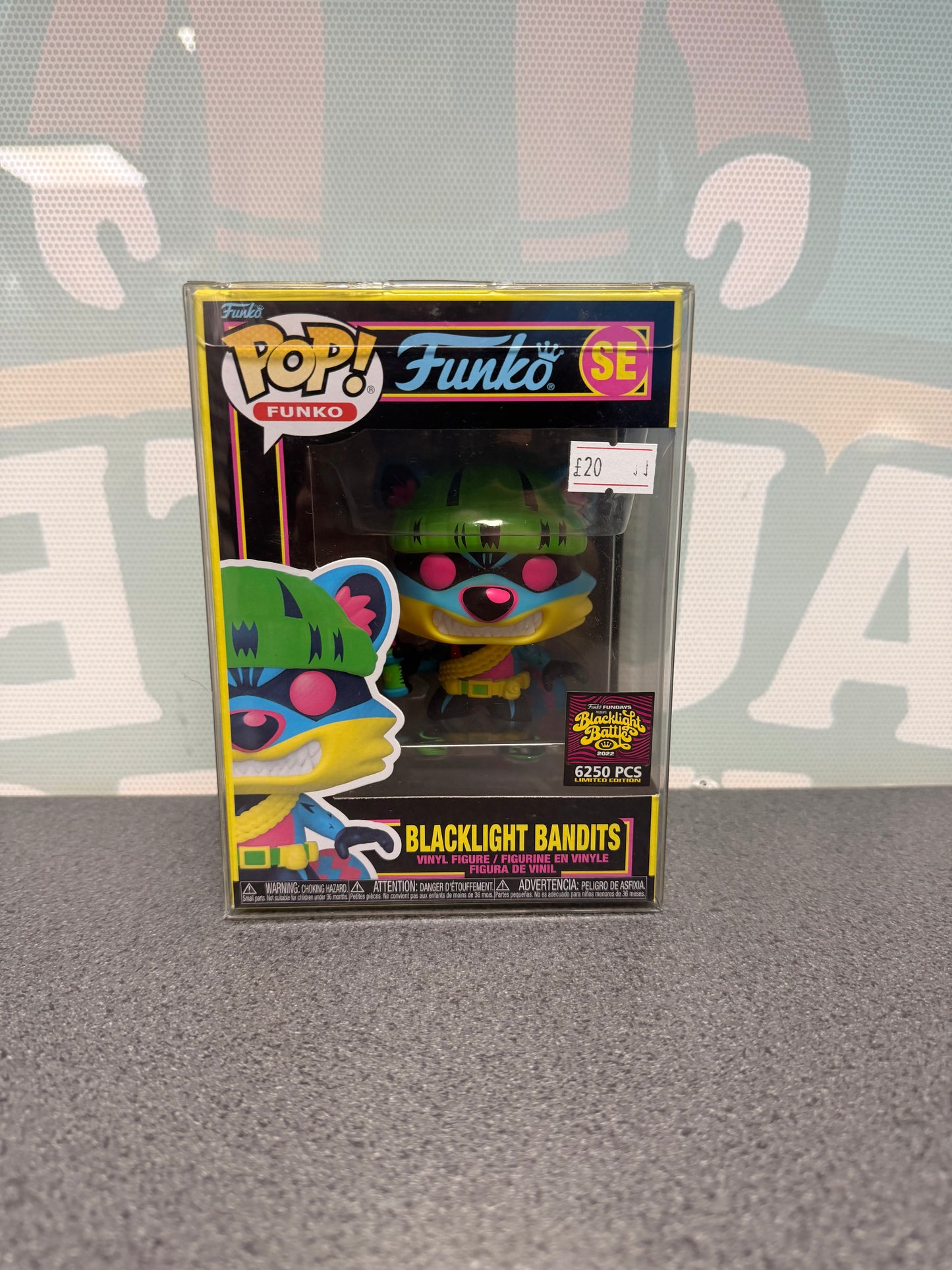Front of Blacklight Bandits Funko Pop! SE with the 6,250-piece Blacklight Battle sticker.