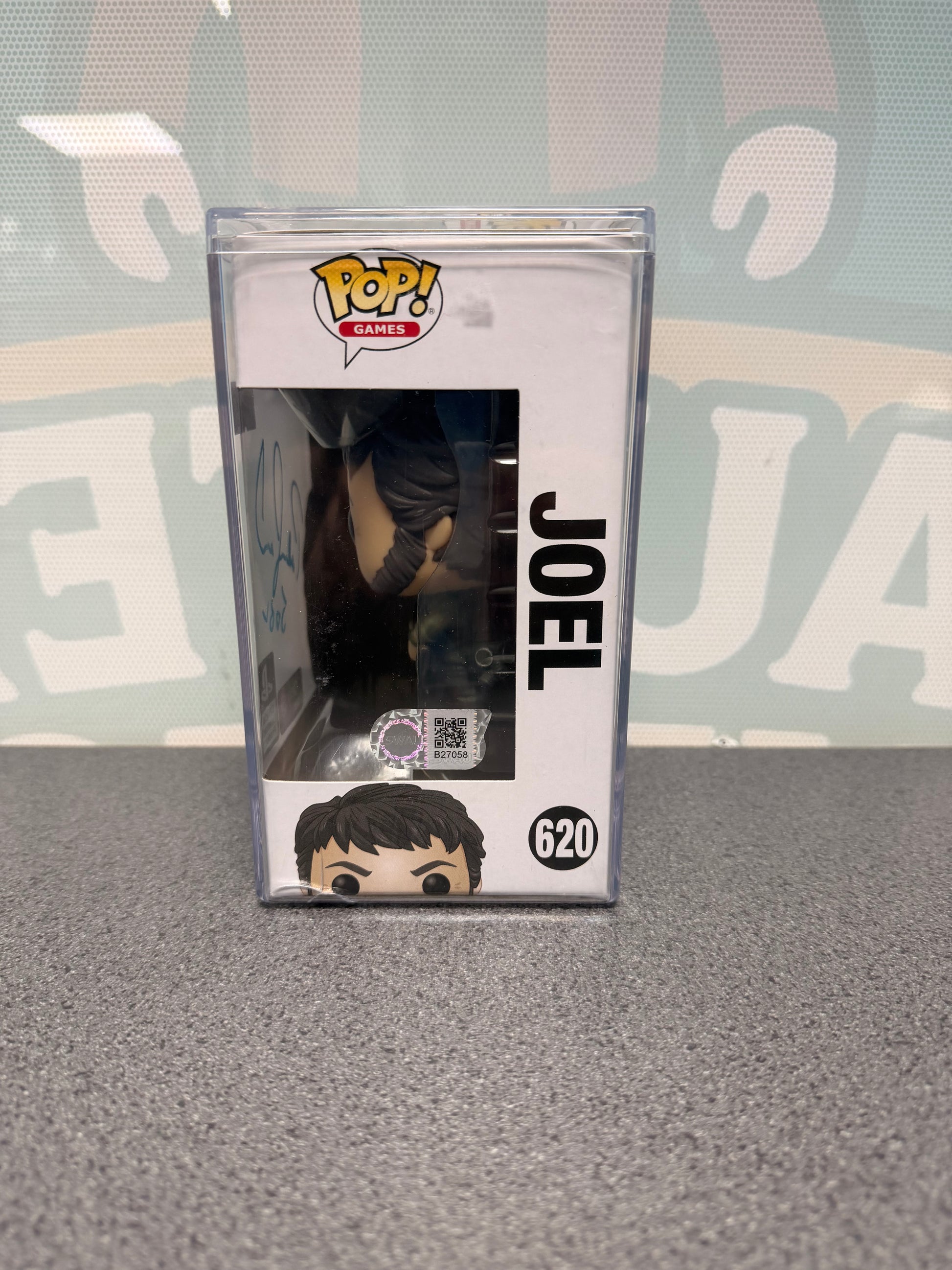 Joel Funko Pop! #620 window side showing SWAU authentication B27058