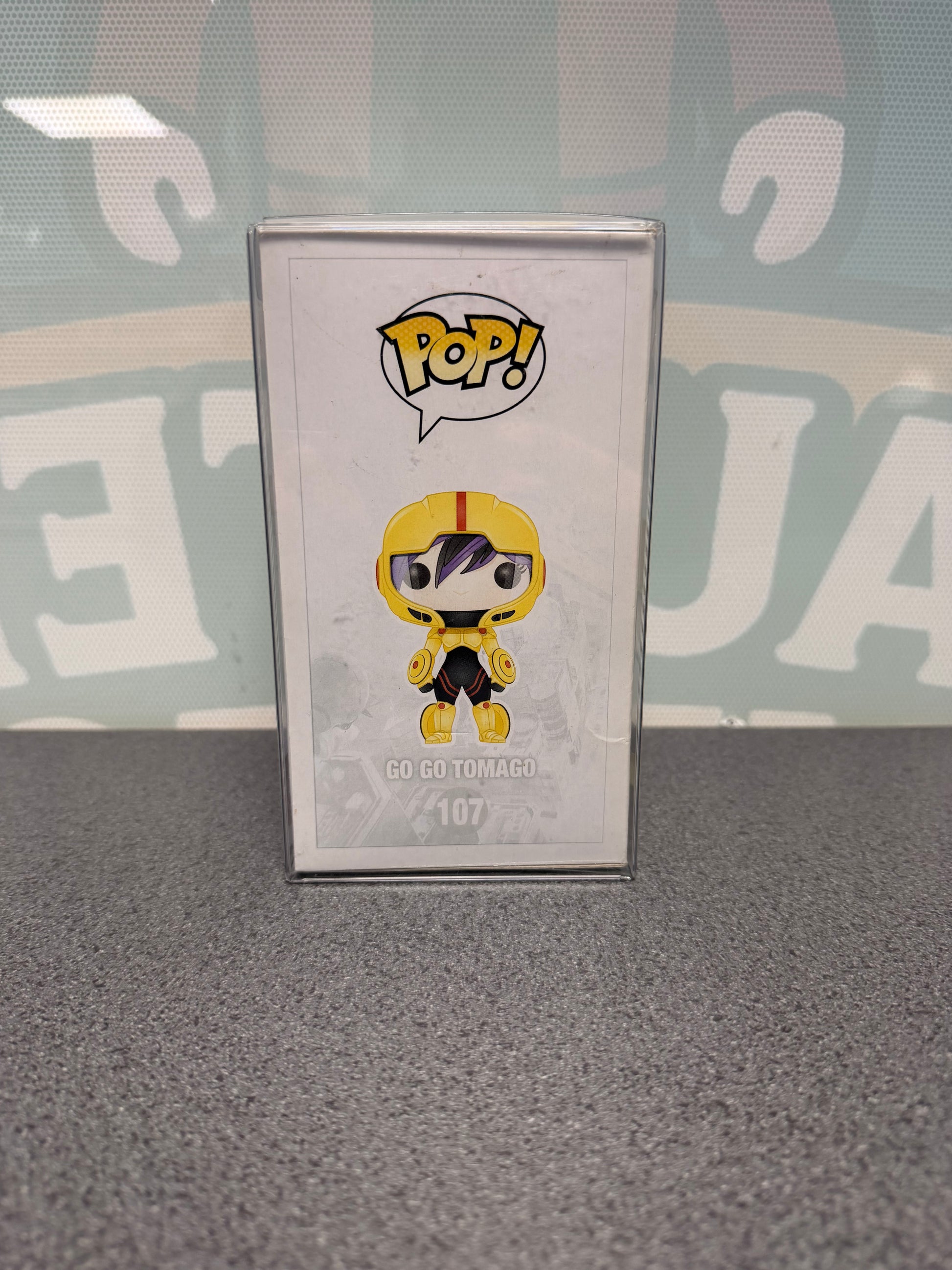 Go Go Tomago Funko Pop! #107 illustrated side of the Big Hero 6 box