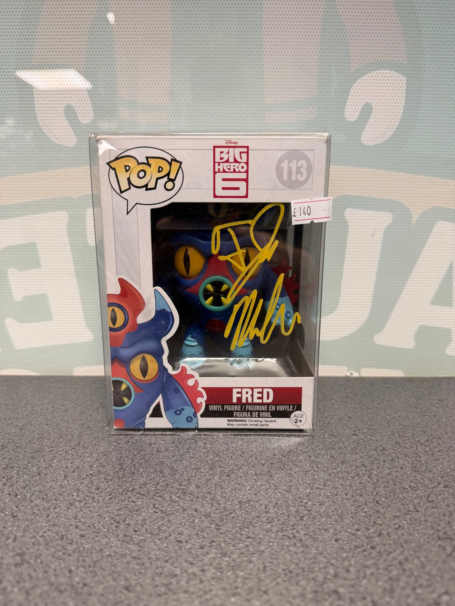 Fred Funko Pop! #113 box front, with a T. J. Miller autograph in yellow ink