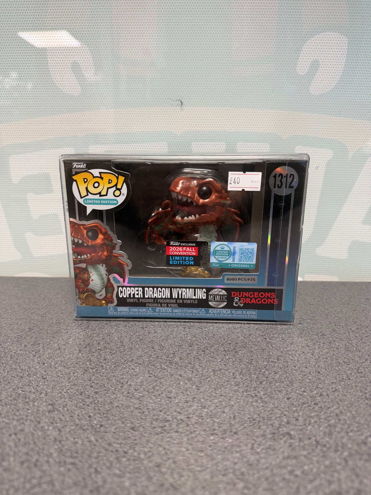 Front of metallic Copper Dragon Wyrmling Funko Pop! #1312 showing the 8000-piece marking and Fall Convention sticker