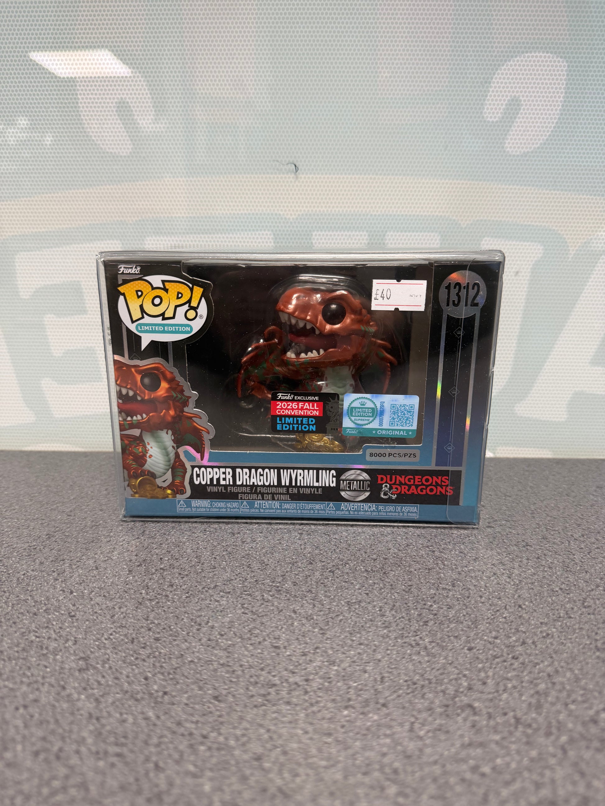 Front of metallic Copper Dragon Wyrmling Funko Pop! #1312 showing the 8000-piece marking and Fall Convention sticker