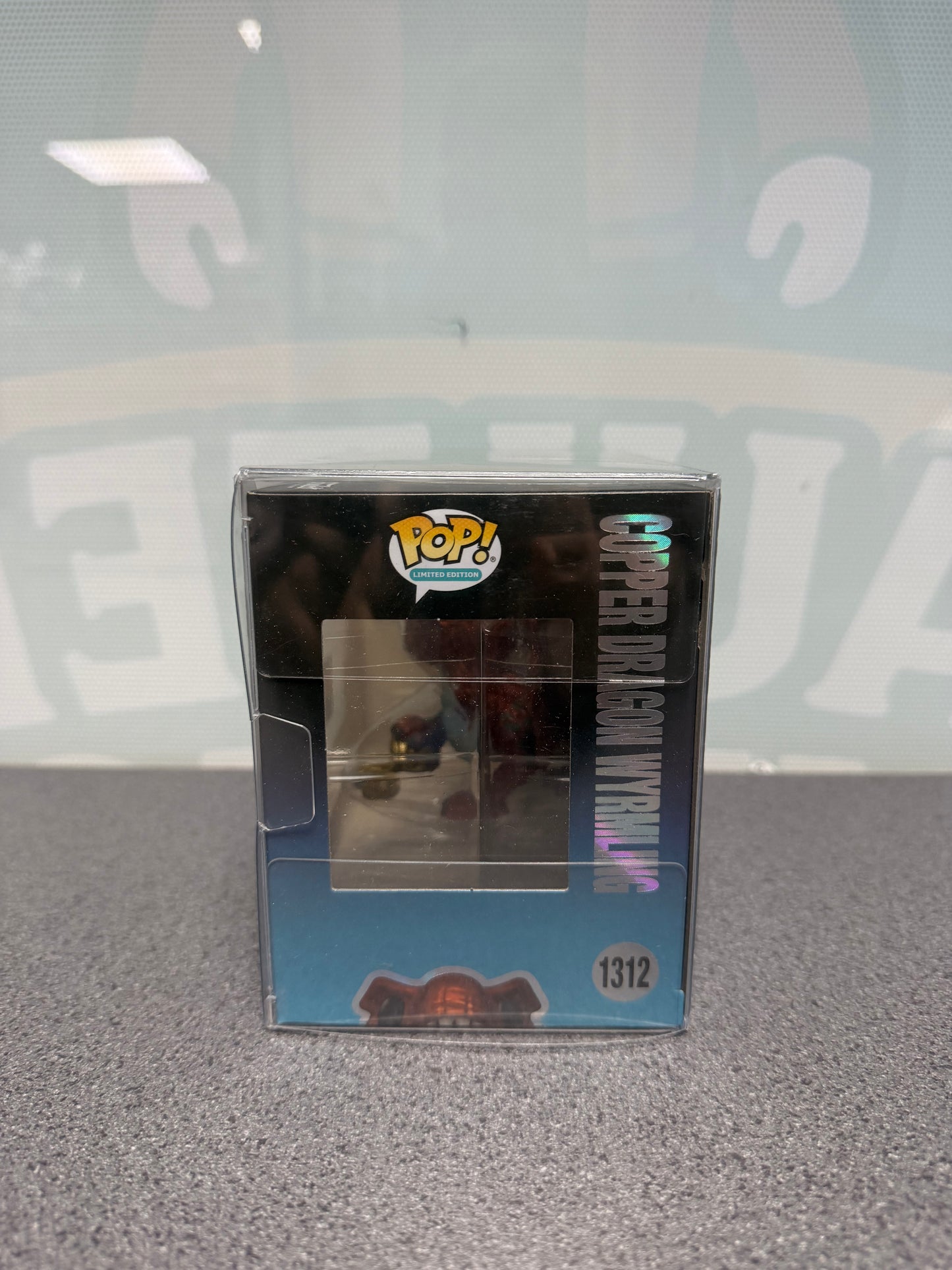 Window side of Copper Dragon Wyrmling Metallic Funko Pop! #1312 packaging