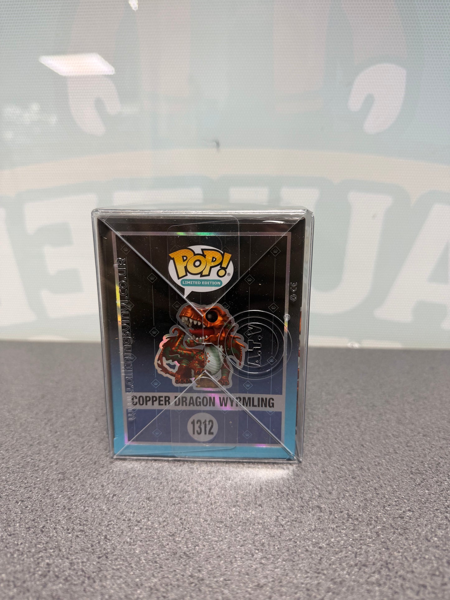Illustrated side panel of Copper Dragon Wyrmling Metallic Funko Pop! #1312 packaging