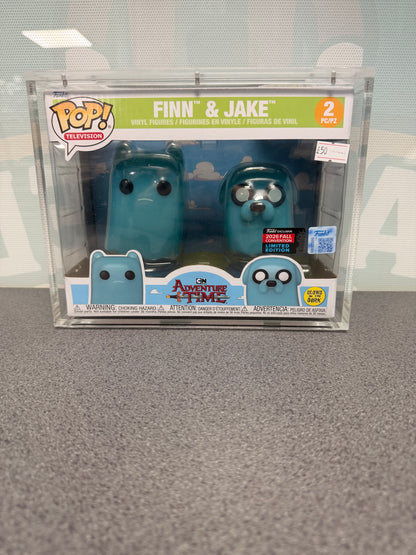 Front of Finn and Jake Adventure Time Funko Pop! 2-pack showing glow and 2026 Fall Convention stickers